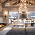 Grand salon lumineux dans un chalet avec baie vitrée et balon.