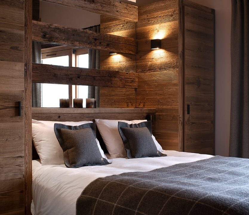 Chambre avec Ambiance chaleureuse et cosy pour cette chambre en mélèze.